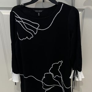 Glamorous tunic for party wear.